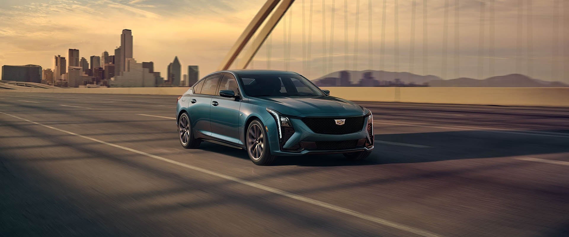 Cadillac CT5 driving on the road - Tom Clark Cadillac in Denton TX